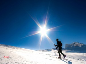 Skiing, sun and snow