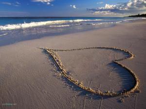 Heart in the sand on the beach