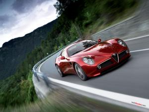 Sport car red Alfa Romeo taking the curve