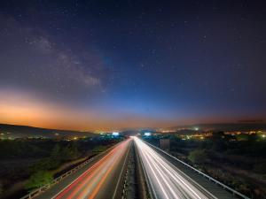 Light lines of the traffic, under a starry night