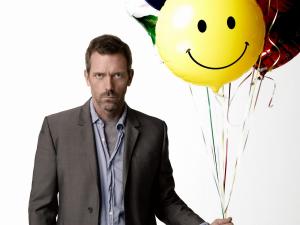 Dr. House with a happy globe