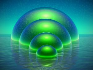 Green spheres rising from the water