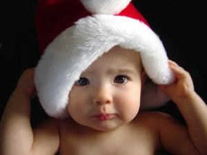 Baby with a Santa Claus hat