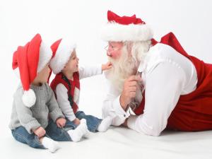 Santa Claus with two children