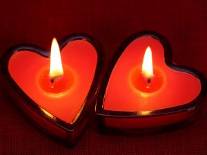 Red candles with heart shape