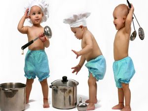 Babies playing to be cooks