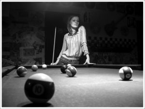 Girl playing pool