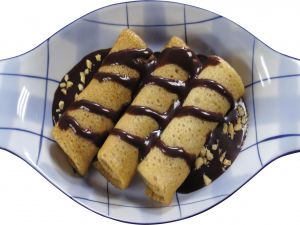 Crepes dipped in chocolate