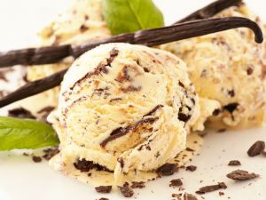 Balls of vanilla ice cream with chocolate