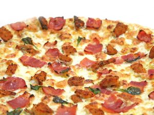 Pizza with bacon and basil