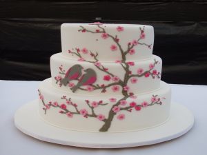 White cake decorated with birds