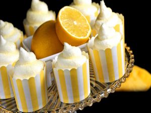 Desserts with orange, cream and sugar