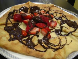 Crepes with strawberries and chocolate