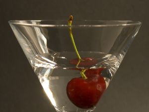 Cocktail glass with a cherry