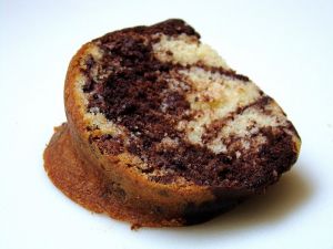 Portion of bundt cake with chocolate and vanilla