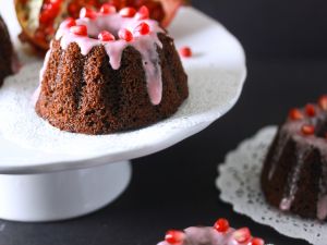 Small chocolate bundt cakes with pomegranate