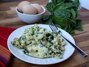 Scrambled eggs with spinach and cheese