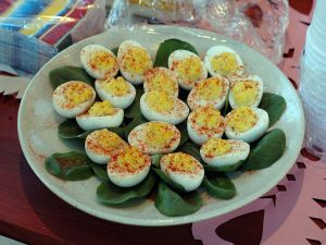 Dish with boiled eggs stuffed
