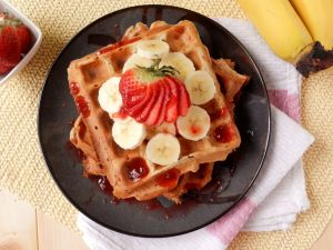 Waffles with strawberries and banana