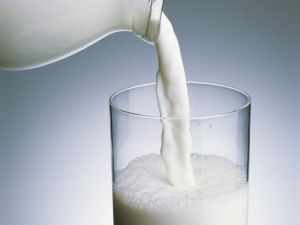 Filling a glass of milk