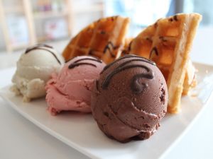 Three flavors of ice cream with waffles