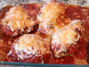Breasts baked with tomato and cheese
