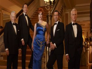 Joan beside to Sterling, Cooper, Draper and Peter Campbell