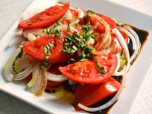 Dish with marinated tomatoes
