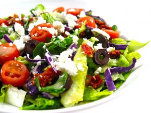 Salad with olives, tomatoes and cheese
