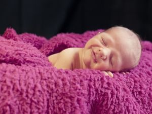 Baby resting and smiling