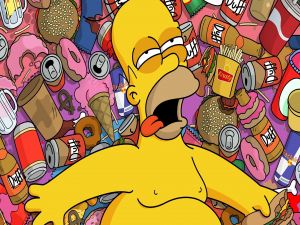 Homer lying over a pile of food and drink