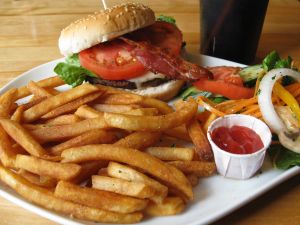 French fries, hamburger and salad