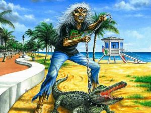 Eddie with a crocodile on the beach