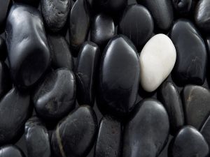 White stone among many black