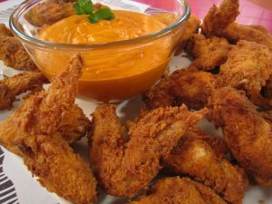 Crispy chicken wings with sauce brava