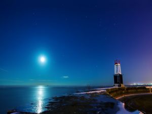 The moon illuminating the sea