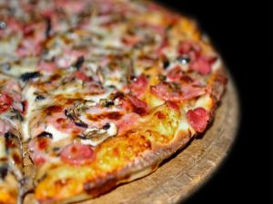 Pizza with ham and mushrooms
