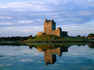 Small castle reflected in water