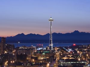 Space Needle lit at night from Seattle