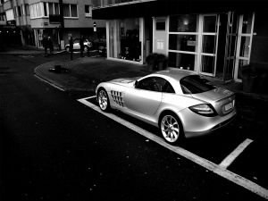 Mercedes parked in the boutique door