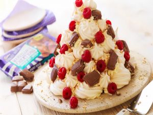 Cake with cream, raspberry and chocolate