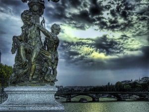 Statue alongside the Seine